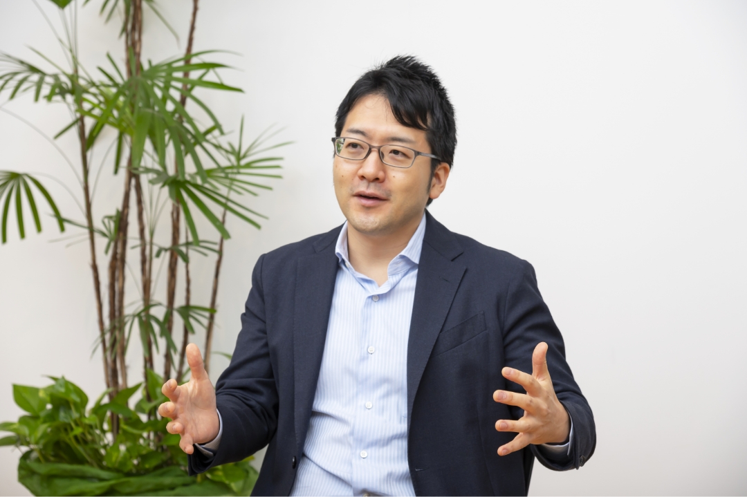 Tokuichiro Suzuki of the Digital Finance Department (Financial Business Division)